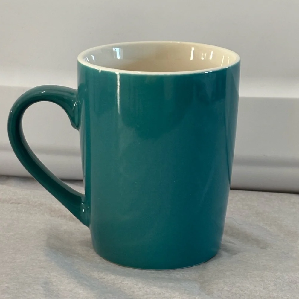 Starbucks Teal Green Logo Mug with Colorful Dog Motif